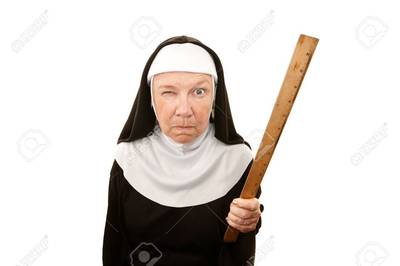 funny nun carrying wooden ruler as a weapon