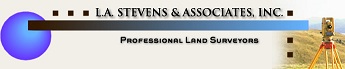 Professional land surveyors using equipment for geomatics and land measurement.